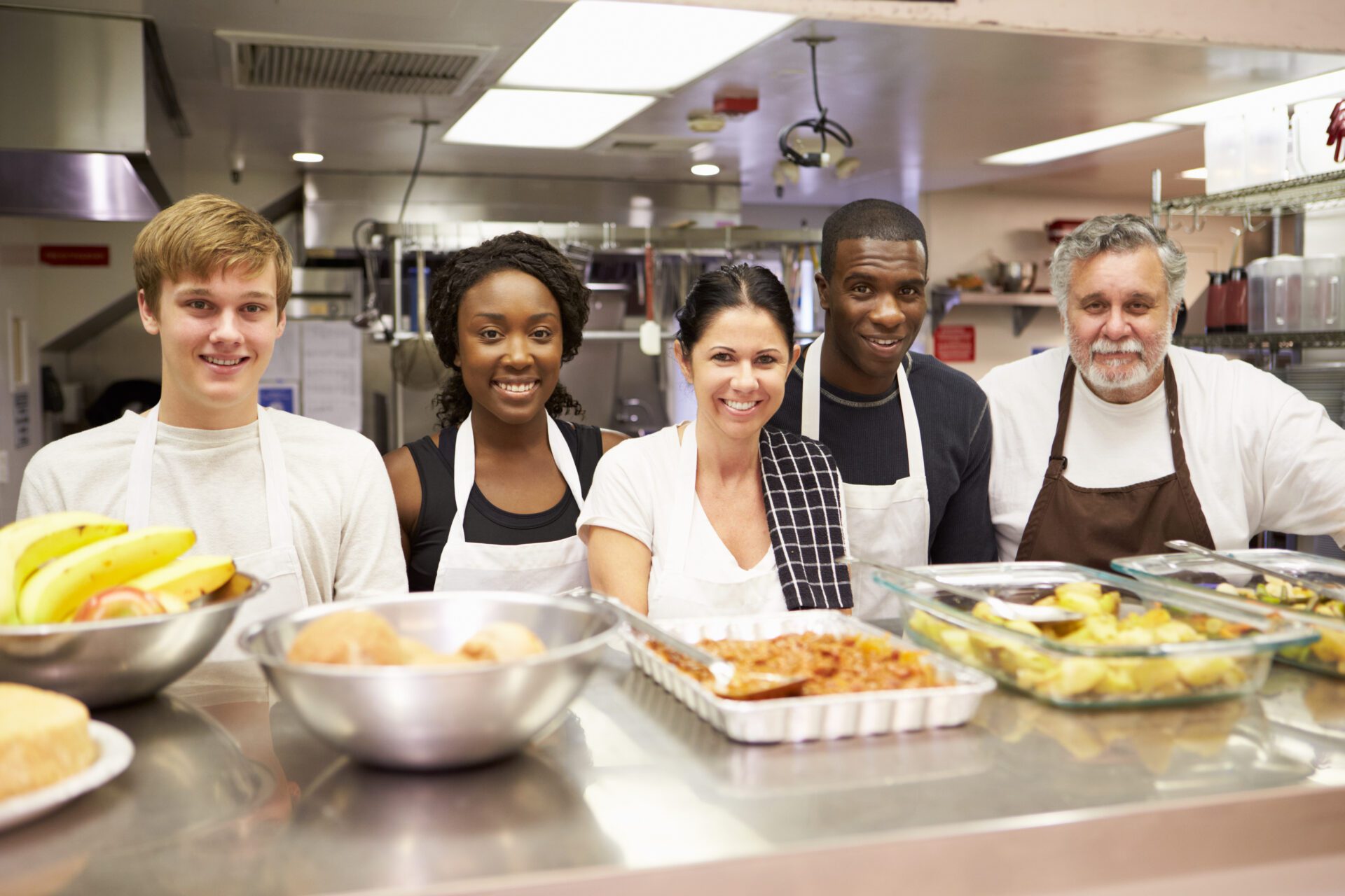Portrait Of Kitchen Staff In Homeless Shelter RE-ENTRY/LIFE SKILLS